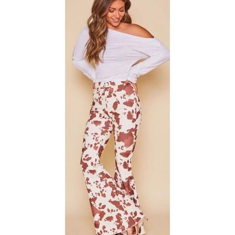 Altar'd State White and Brown Cowprint Flare Pants
